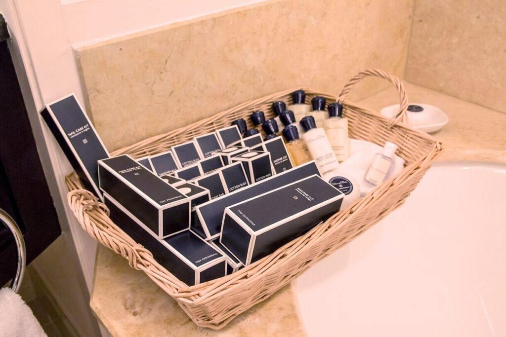 Plastic containers of hotel amenities 