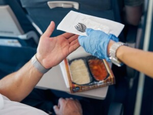 ecofriendly business travel green sustainable toiletries airlines plane plastic cutlery